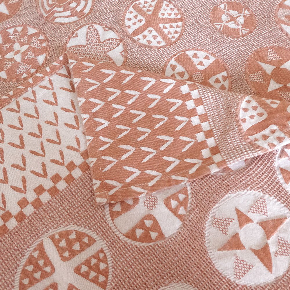 Customized tablecloth with jacquard woven Botswana basket pattern in nude and white